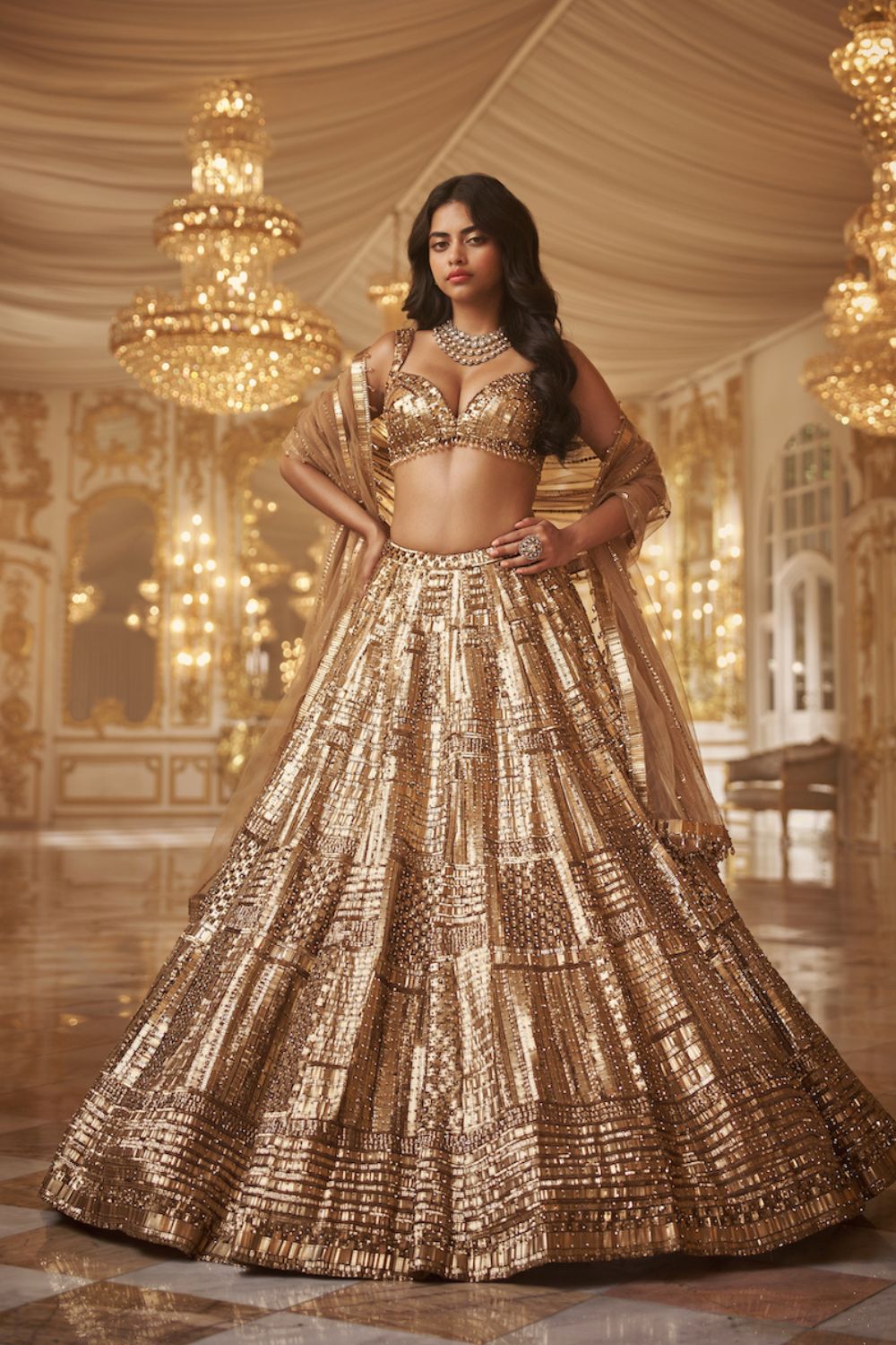 Gold lehengas shop