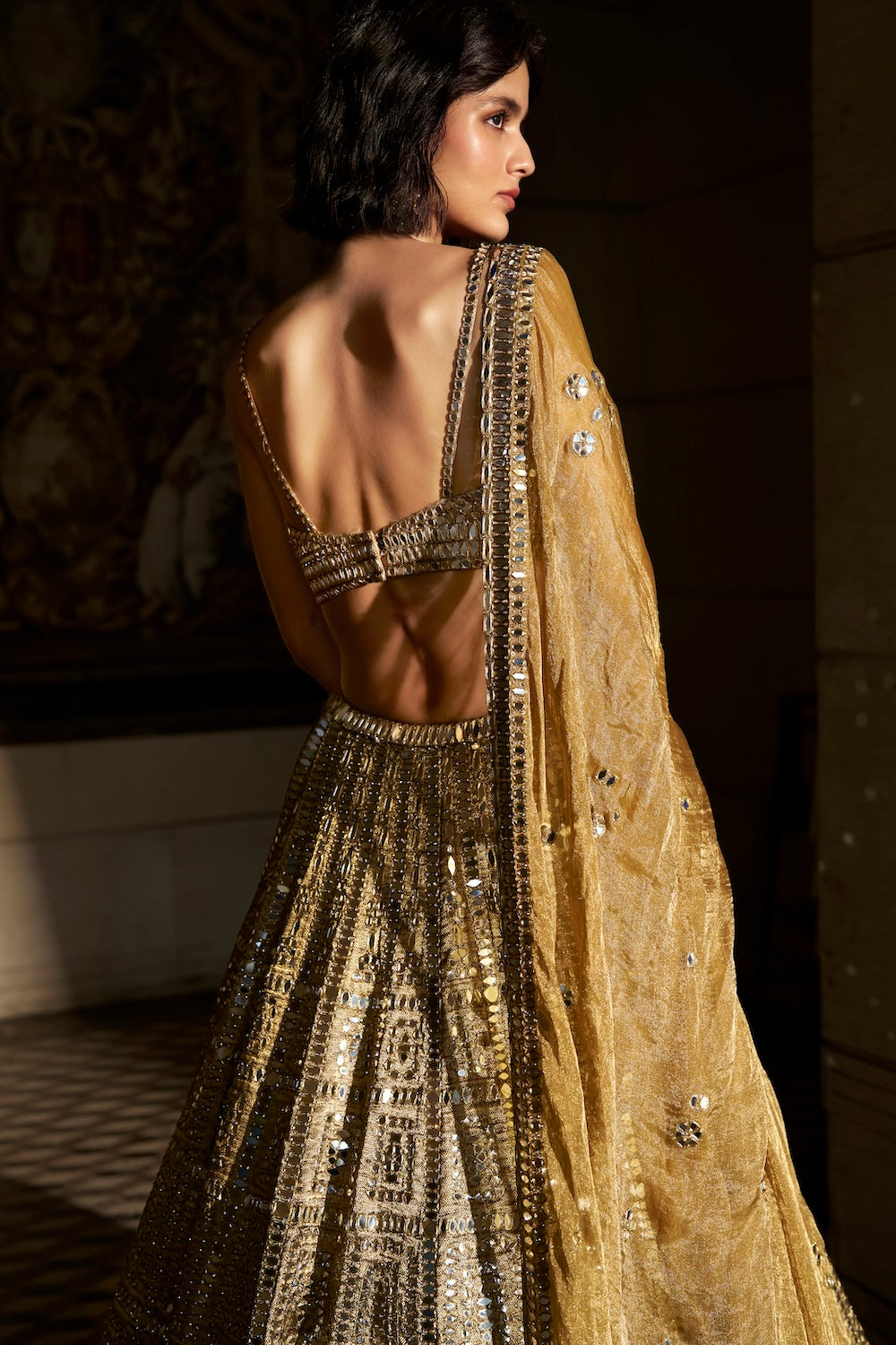 Antique Gold Mirror Work Lehenga Set