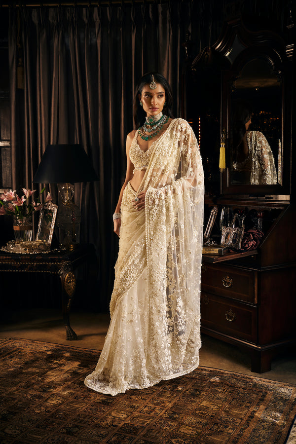 Buy pre owned White embellished lehenga set by Seema Gujral at Revivify