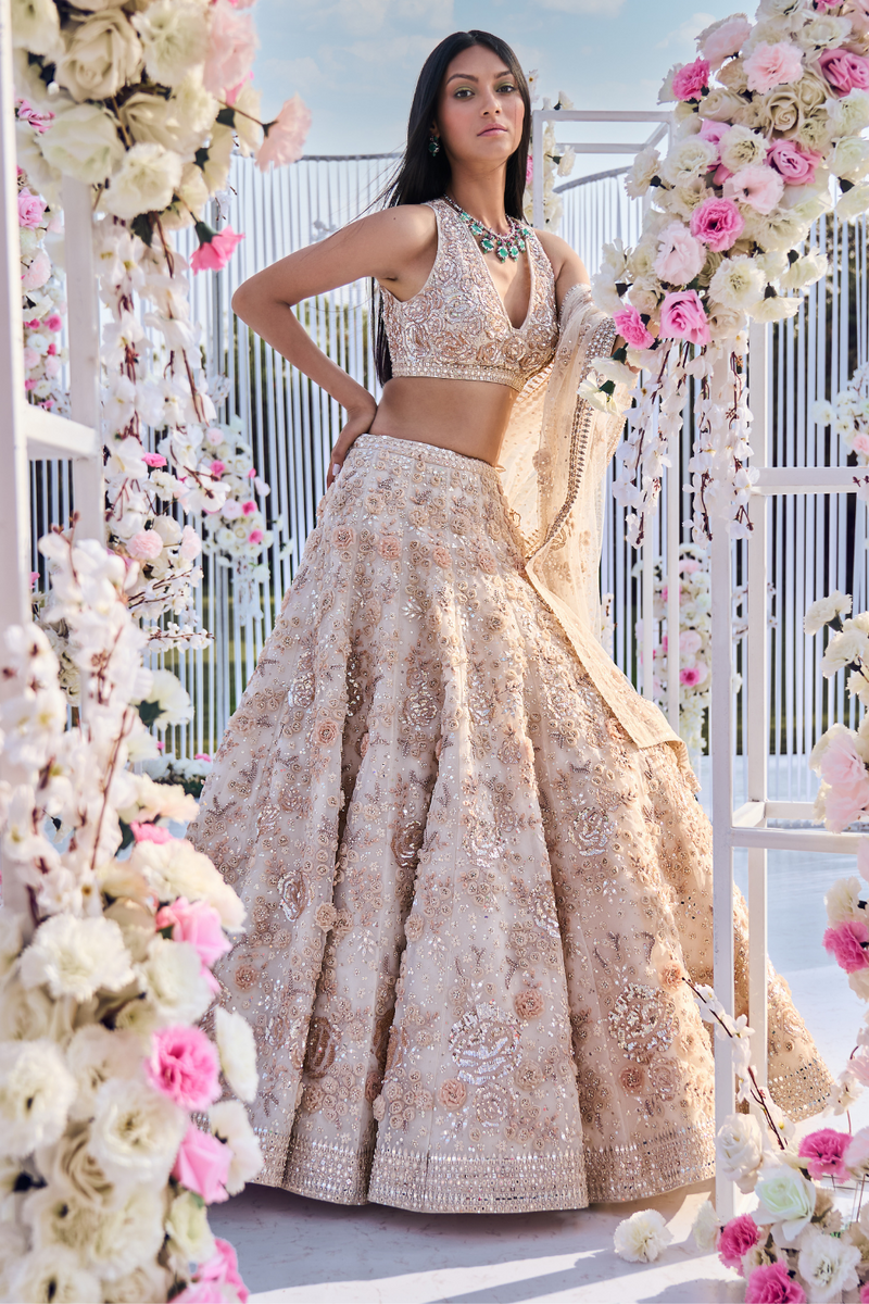 Photo of Floral embroidery cream and pink lehenga