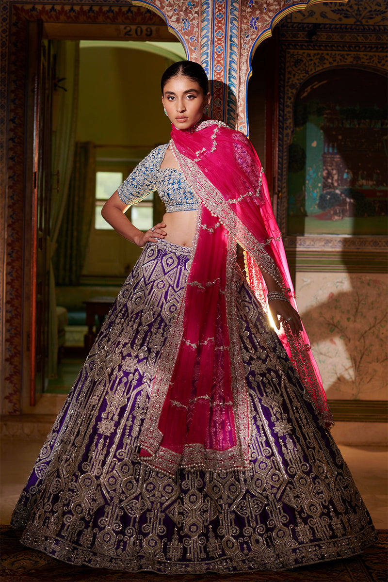 Photo of Strawberry Red Bridal Lehenga with Silver Embroidery